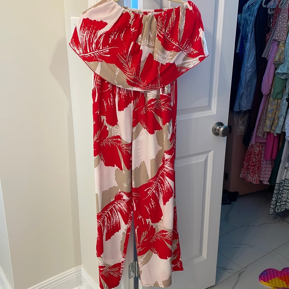 Red tropical jumpsuit. Size M. Selling for $30